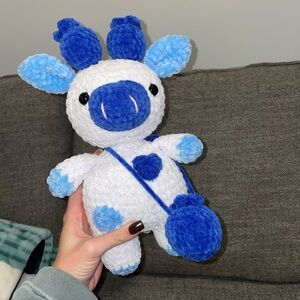 Hand crocheted blueberry cow